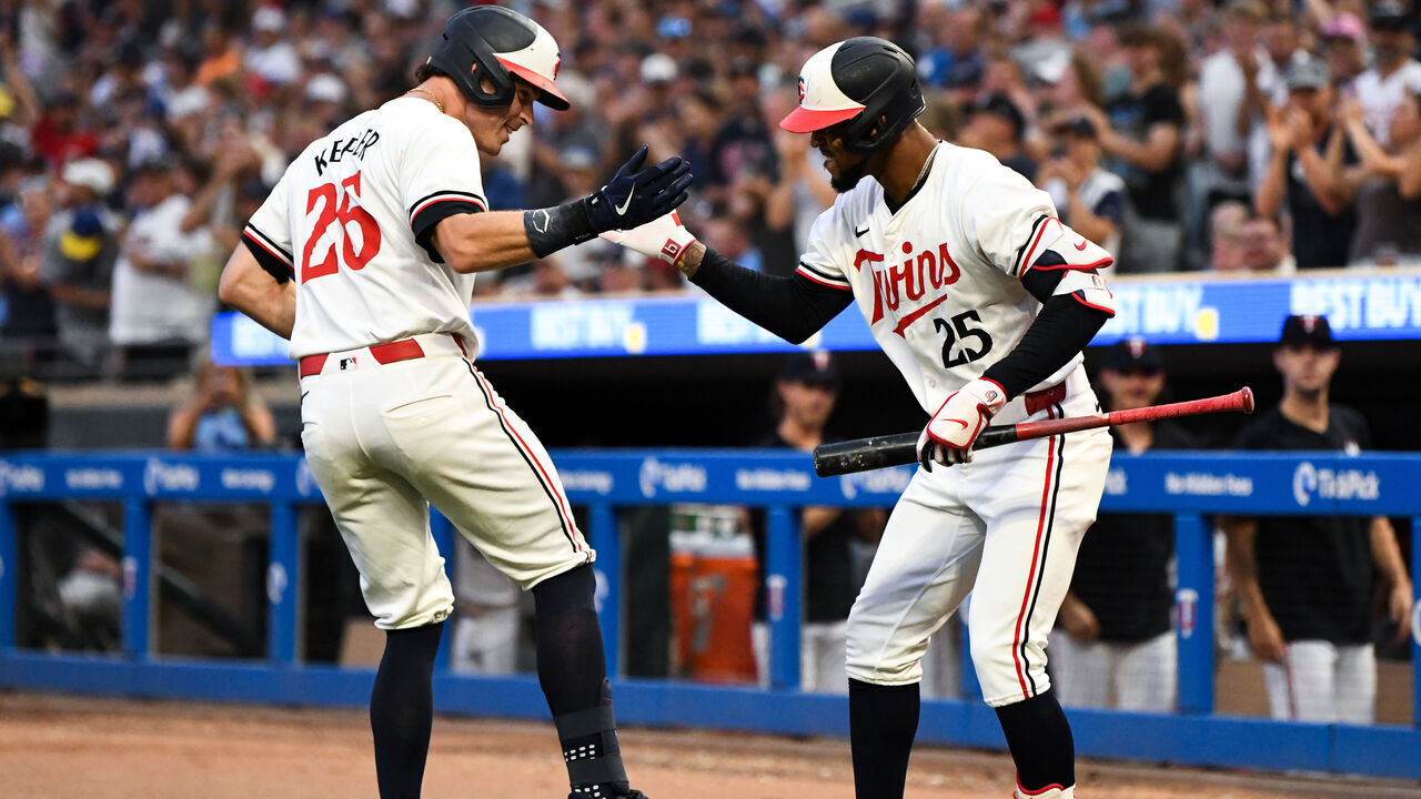 MINNEAPOLIS, MINNESOTA - AUGUST 3: Max Kepler #26 of the Minnesota Twins celebrates his go-ahead home run with Byron Buxton #25 in the eighth inning against the Chicago White Sox at Target Field on August 3, 2024 in Minneapolis, Minnesota.