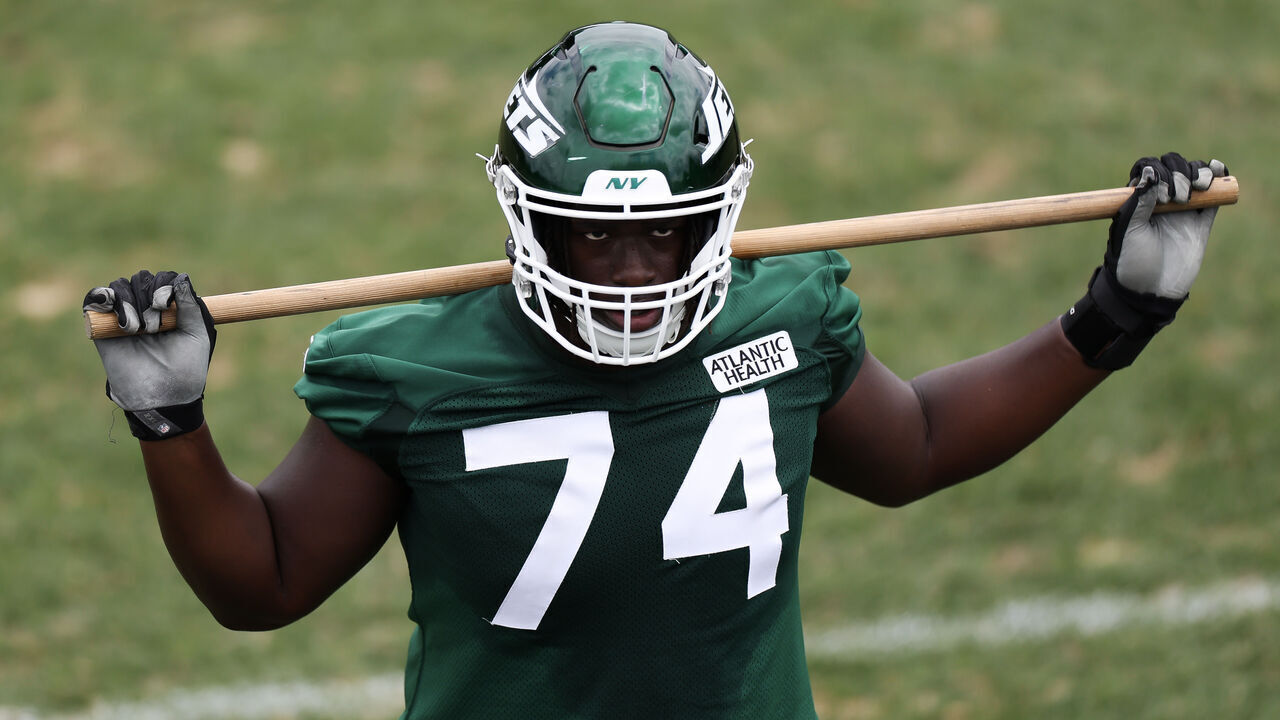 FLORHAM PARK, NEW JERSEY - JUNE 11: Olu Fashanu #74 of the New York Jets participates in drills during New York Jets Mandatory Minicamp at Atlantic Health Jets Training Center on June 11, 2024 in Florham Park, New Jersey.