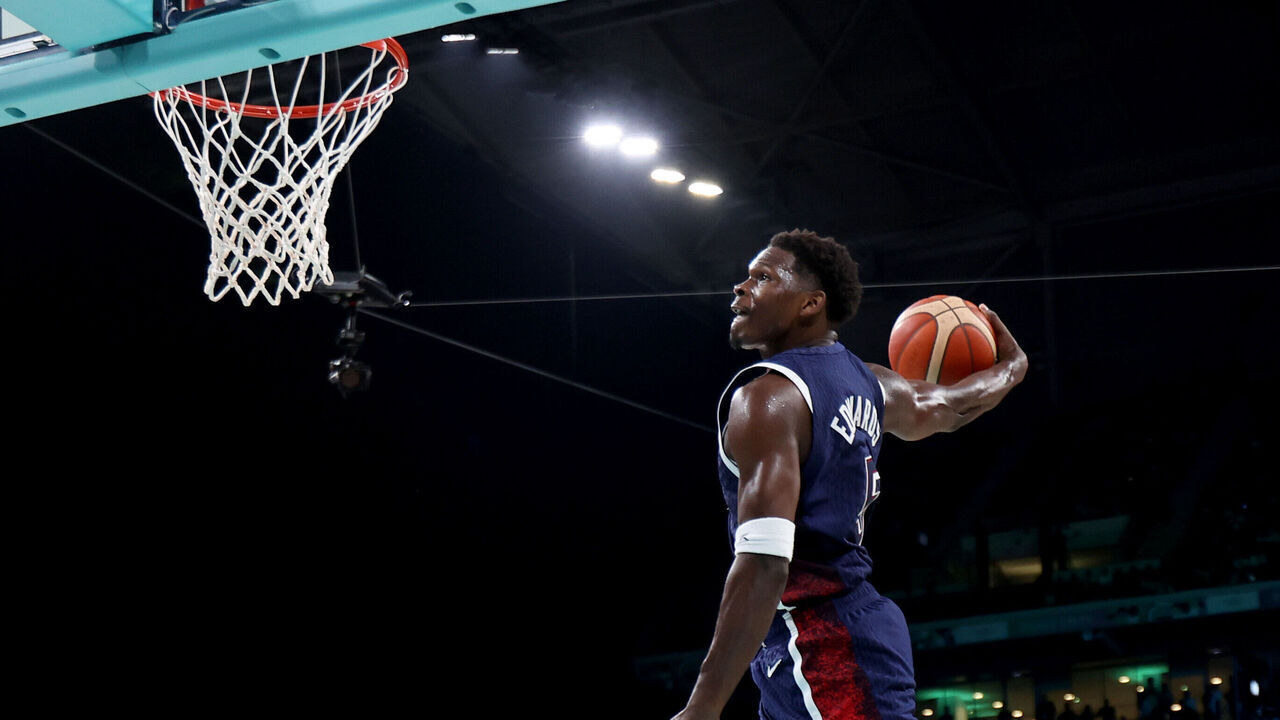 LILLE, FRANCE - AUGUST 03: Anthony Edwards #5 of Team United States goes up for a dunk during a Men's basketball group phase-group C game between the United States and Puerto Rico on day eight of the Olympic Games Paris 2024 at Stade Pierre Mauroy on August 03, 2024 in Lille, France.