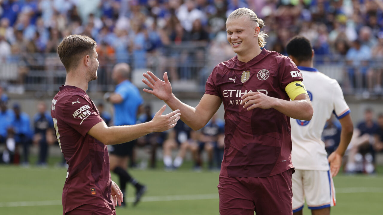 COLUMBUS, OH - AUGUST 03: Manchester City forward Erling Haaland (9) celebrates with midfielder James McAtee (87) after scoring a goal during the preseason friendly against Chelsea on August 3, 2024 at Ohio Stadium in Columbus, Ohio.