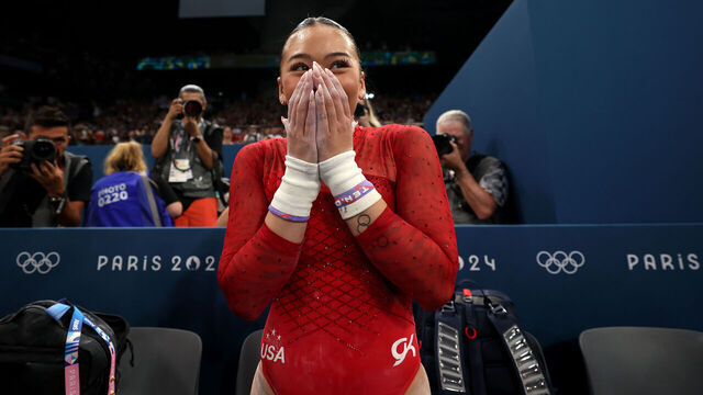 PARIS, FRANCE - AUGUST 04: Sunisa Lee of Team United States celebrates winning the Bronze medal during the Artistic Gymnastics Women's Uneven Bars Final on day nine of the Olympic Games Paris 2024 at Bercy Arena on August 04, 2024 in Paris, France.