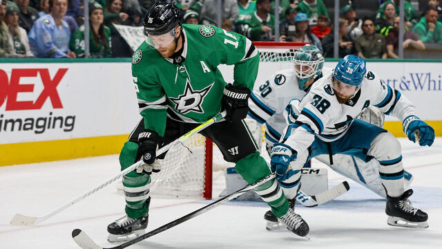 DALLAS, TX - MARCH 02: Dallas Stars center Joe Pavelski (16) and San Jose Sharks defenseman Mario Ferraro (38) battle for the puck in front of goaltender Magnus Chrona (30) during the game between the Dallas Stars and the San Jose Sharks on March 2, 2024 at American Airlines Center in Dallas, Texas.