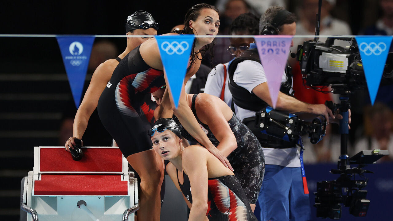 NANTERRE, FRANCE - AUGUST 04: Sophie Angus, Kylie Masse, Margaret Macneil and Summer McIntosh of Team Canada reactduring the Women's 4 x 100m Medley Relay final on day nine of the Olympic Games Paris 2024 at Paris La Defense Arena on August 04, 2024 in Nanterre, France.
