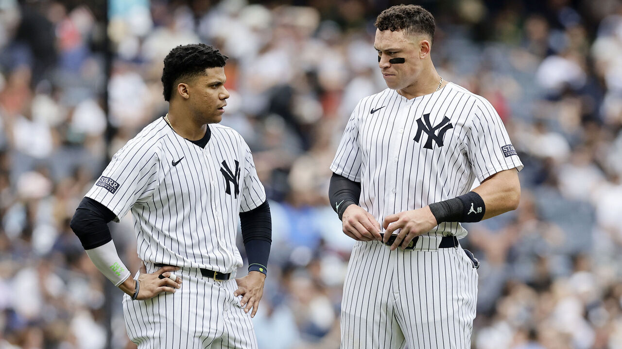 NEW YORK, NEW YORK - MAY 23: Juan Soto #22 and Aaron Judge #99 of the New York Yankees talk on the field after both were stranded on base after the fifth inning against the Seattle Mariners at Yankee Stadium on May 23, 2024 in New York City.