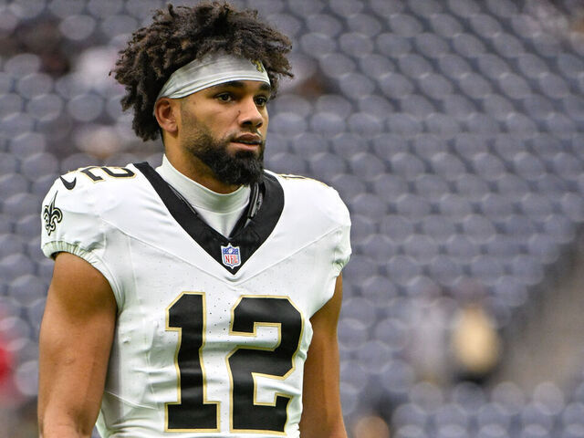 HOUSTON, TX - OCTOBER 15: New Orleans Saints wide receiver Chris Olave (12) warms up before the football game between the New Orleans Saints and Houston Texans at NRG Stadium on October 15, 2023, in Houston, Texas.