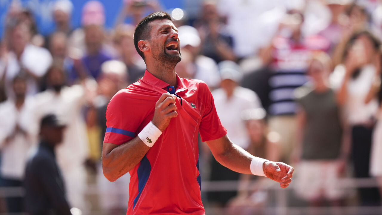 SAINT-DENIS, FRANCE - AUGUST 4: Novak Djokovic of Team Serbia celebrates after winning the gold medal over Carlos Alcaraz of Team Spain in the Men's Singles Tennis at Roland Garros during the Paris 2024 Olympics on August 4, 2024.