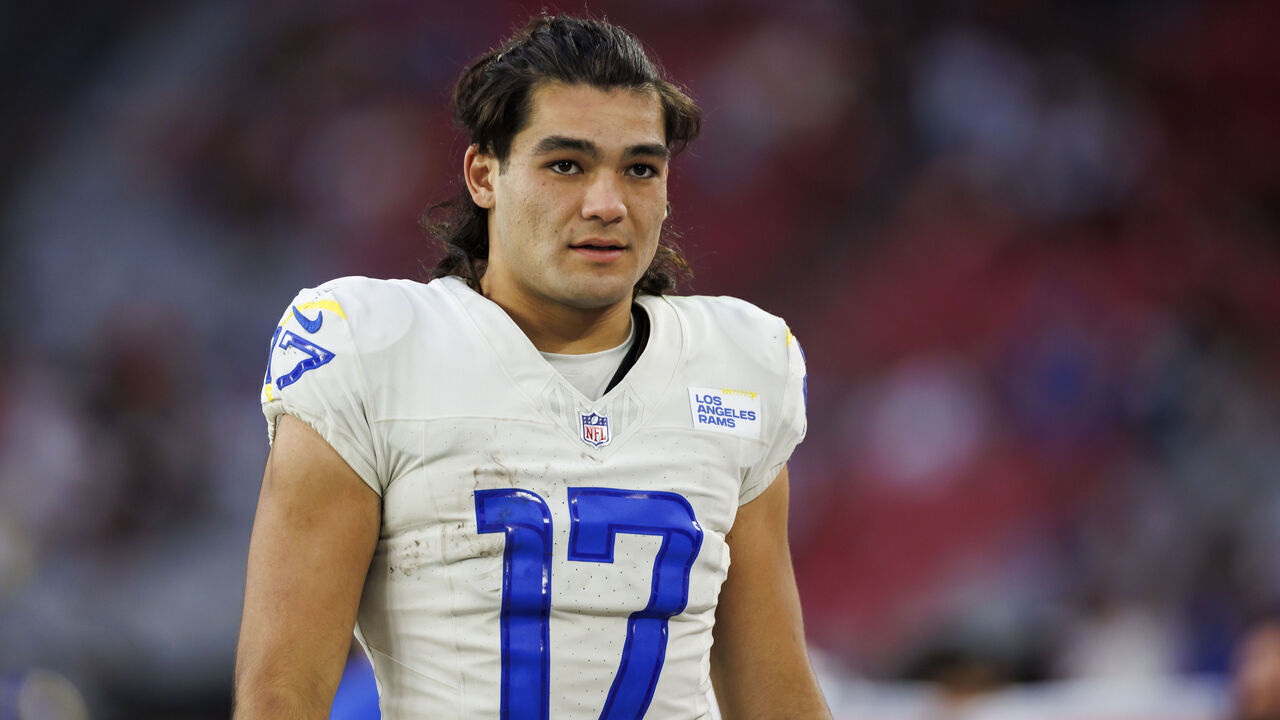 GLENDALE, ARIZONA - NOVEMBER 26: Puka Nacua #17 of the Los Angeles Rams looks on from the sideline during an NFL football game against the Arizona Cardinals at State Farm Stadium on November 26, 2023 in Glendale, Arizona.