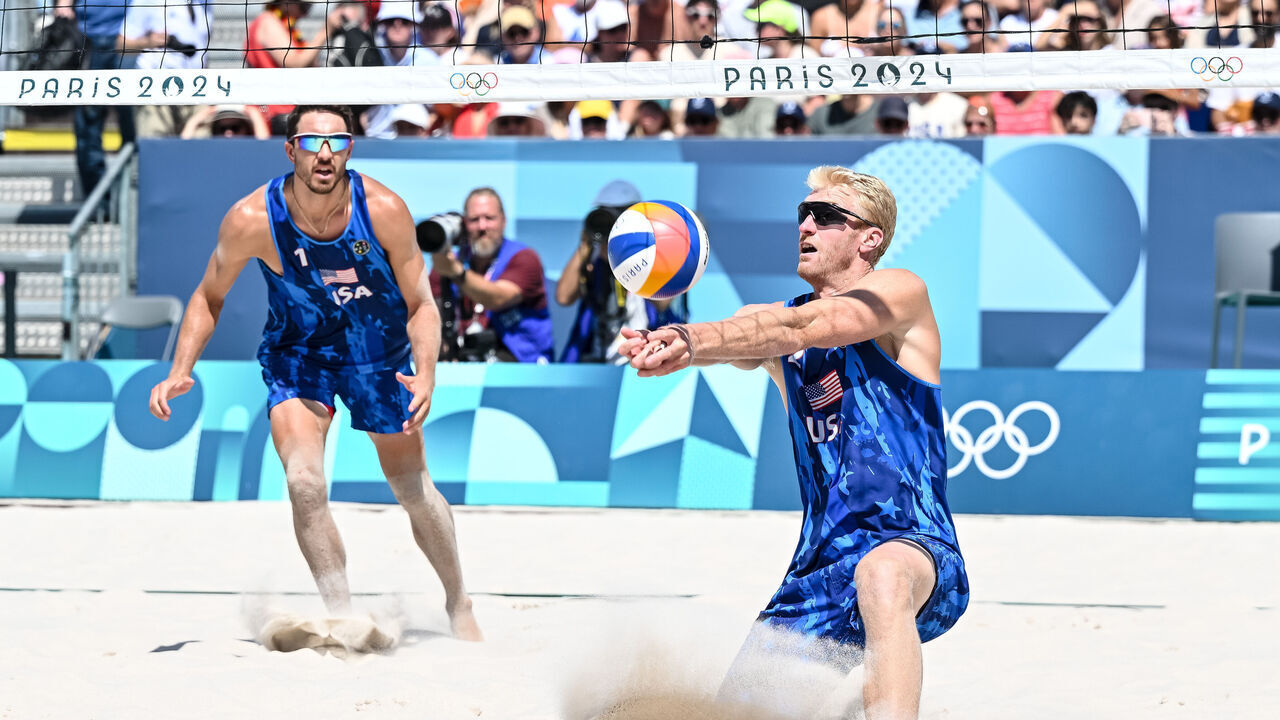 Chase Budinger of USA controls the Ball during the Men's Beach Volleyball Round of 16 match between Miles Evans of USA,Chase Budinger of USA and Anders Berntsen Mol of Norway Christian Sandlie Soerum of Norway on Day 10 of the Olympic Games Paris 2024 at Eiffel Tower Stadium on August 5, 2024 in Paris, France.