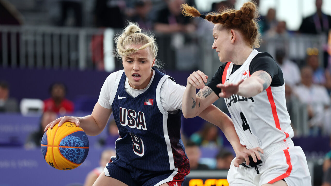 PARIS, FRANCE - AUGUST 05: Hailey van Lith #9 of Team United States drives past cduring a Women's 3x3 basketball Bronze medal game between the United States and Canada on day ten of the Olympic Games Paris 2024 at Esplanade Des Invalides on August 05, 2024 in Paris, France.