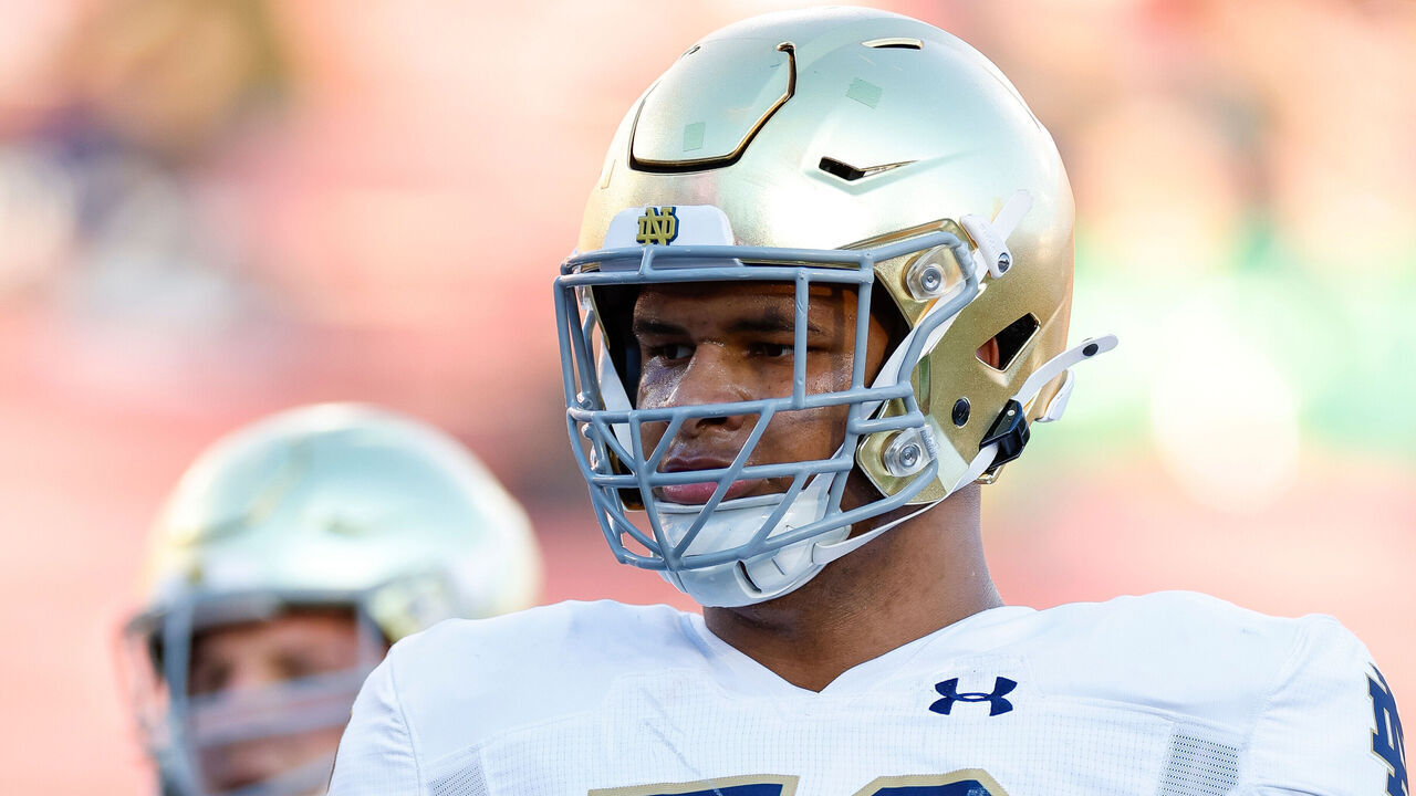 STANFORD, CALIFORNIA - NOVEMBER 25: Charles Jagusah #56 of the Notre Dame Fighting Irish warms up prior to a game against the Stanford Cardinal at Stanford Stadium on November 25, 2023 in Stanford, California.