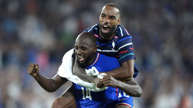 BORDEAUX, FRANCE - AUGUST 02: Jean-Philippe Mateta #14 and Alexandre Lacazette #10 of Team France celebrates victory after the Men's Quarterfinal match between France and Argentina during the Olympic Games Paris 2024 at Nouveau Stade de Bordeaux on August 02, 2024 in Bordeaux, France.