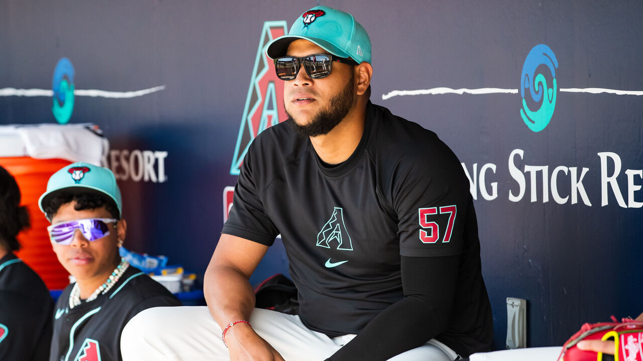 SCOTTSDALE, ARIZONA - MARCH 13: Eduardo Rodriguez #57 of the Arizona Diamondbacks sits in the dugout during the Spring Training game against the Colorado Rockies at Salt River Fields at Talking Stick on March 13, 2024 in Scottsdale, Arizona.