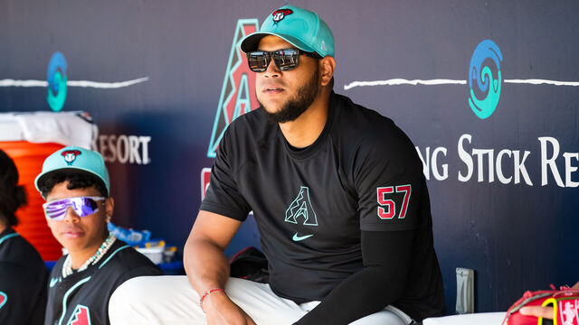SCOTTSDALE, ARIZONA - MARCH 13: Eduardo Rodriguez #57 of the Arizona Diamondbacks sits in the dugout during the Spring Training game against the Colorado Rockies at Salt River Fields at Talking Stick on March 13, 2024 in Scottsdale, Arizona.