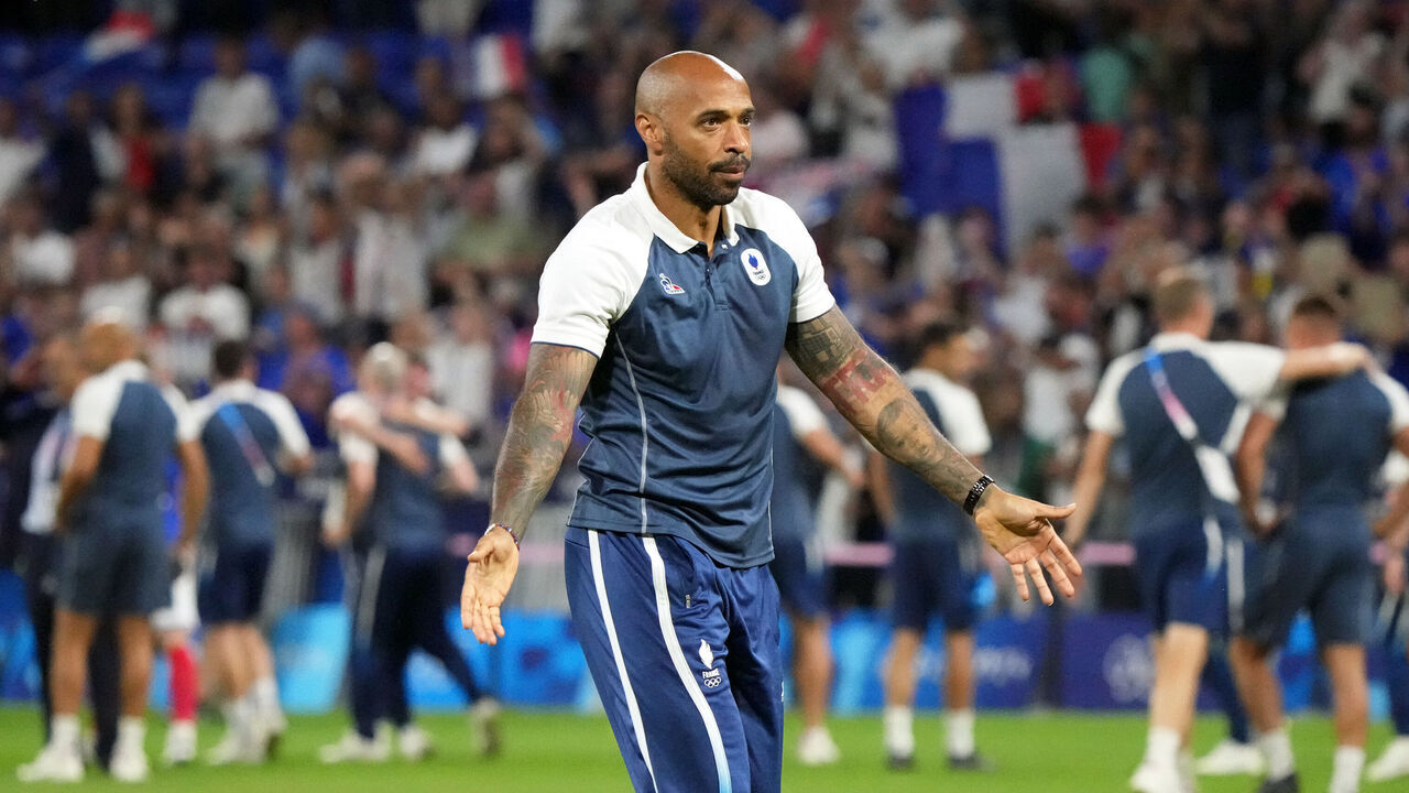 LYON, FRANCE - AUGUST 05: Thierry Henry, Head Coach of Team France acknowledges the fans after winning during the Men's semifinal match between France and Egypt during the Olympic Games Paris 2024 at Stade de Lyon on August 05, 2024 in Lyon, France.