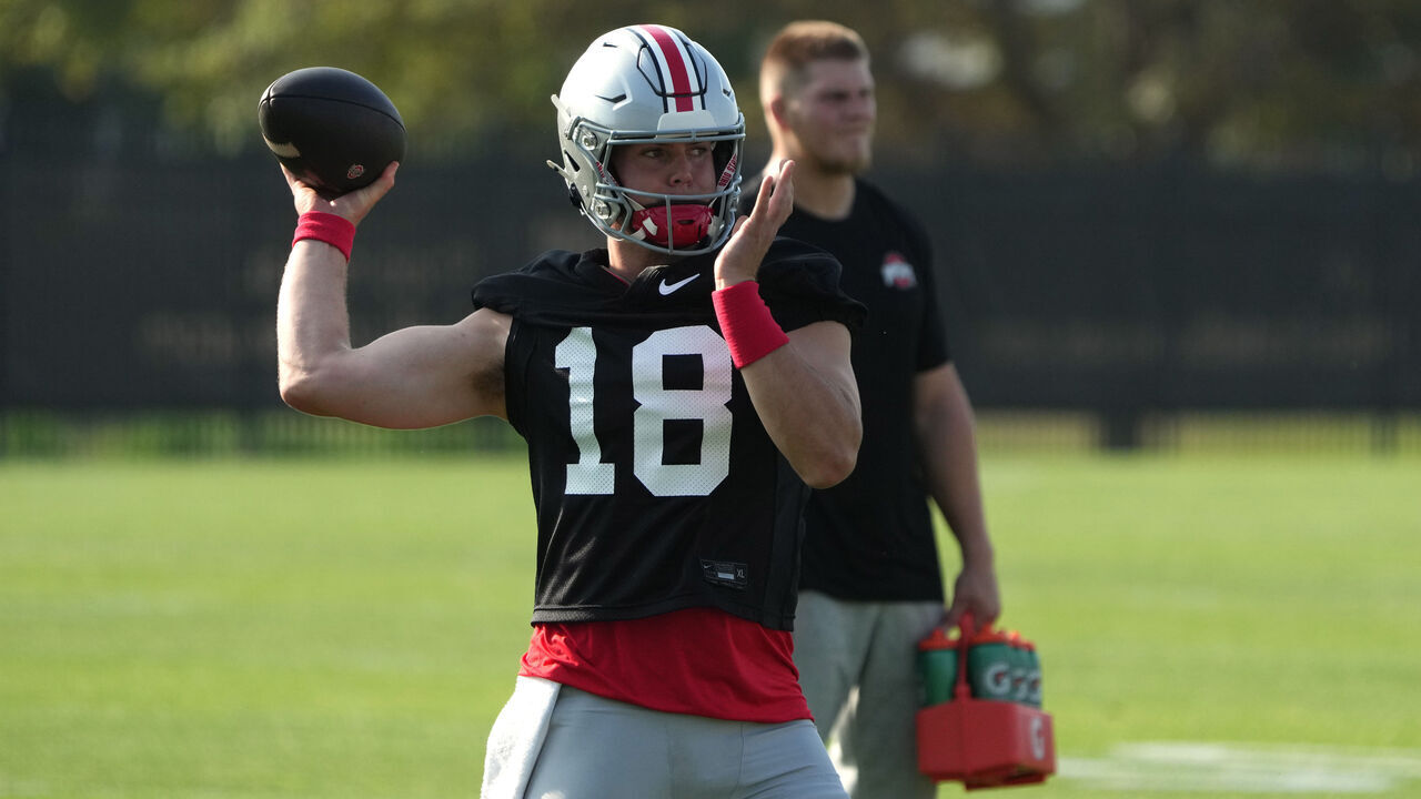 COLUMBUS, OHIO - AUGUST 01: Will Howard #18 of the Ohio State Buckeyes at the throws the ball during fall camp at the Woody Hayes Athletic Center on August 01, 2024 in Columbus, Ohio.