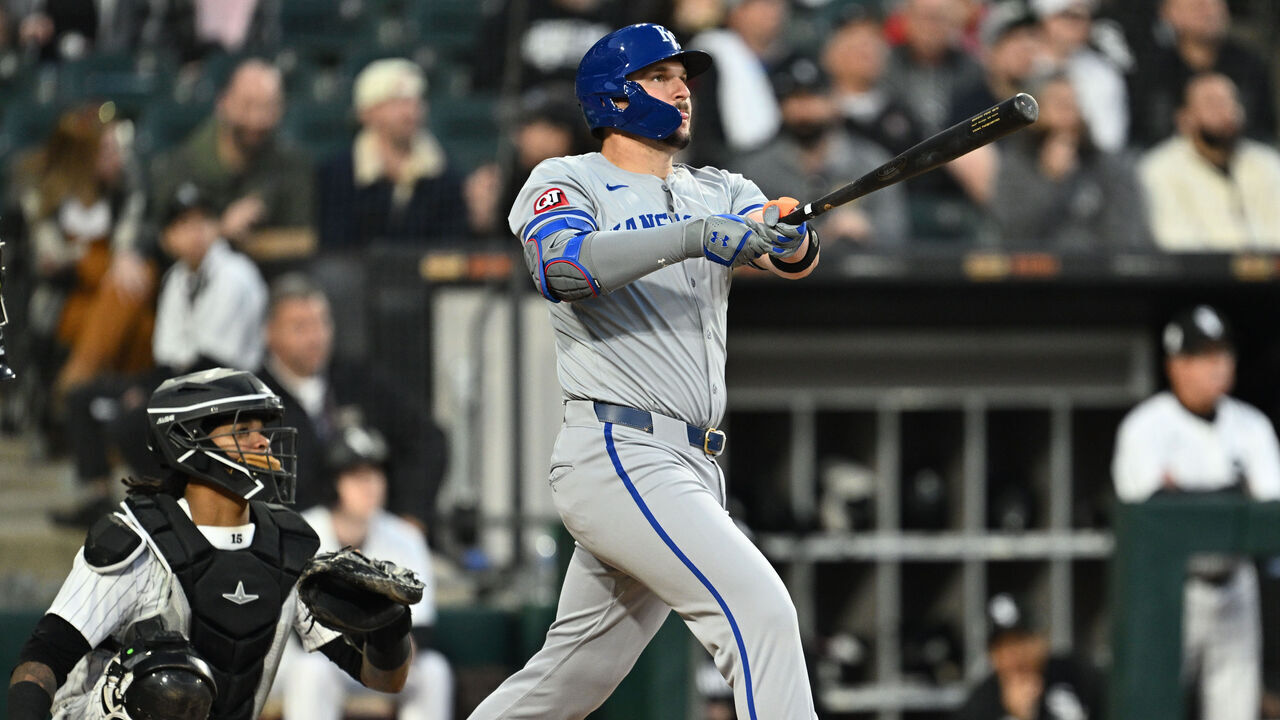 CHICAGO, IL - APRIL 15: Vinnie Pasquantino #9 of the Kansas City Royals hits a home run in the fourth inning against the Chicago White Sox at Guaranteed Rate Field on April 15, 2024 in Chicago, Illinois. All players are wearing the number 42 in honor of Jackie Robinson Day.