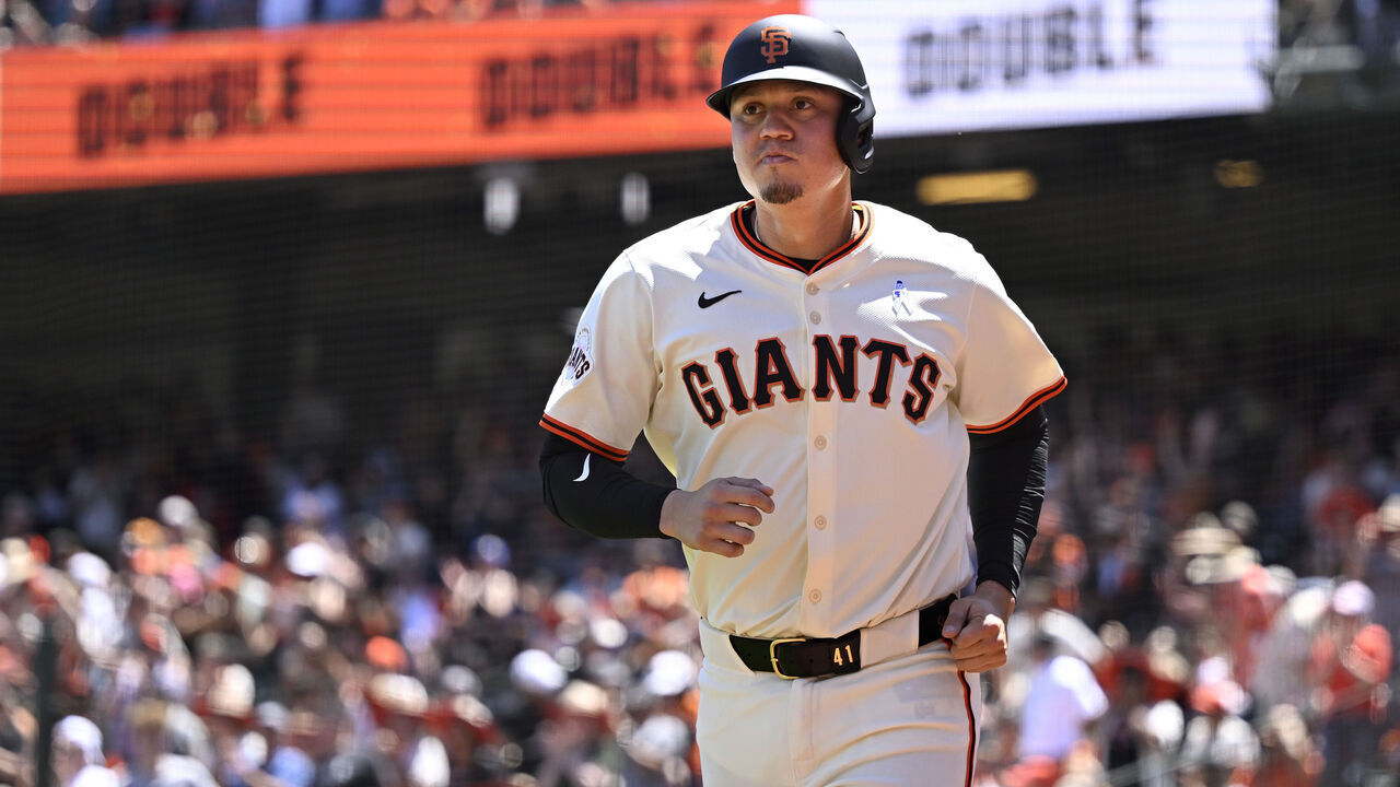 SAN FRANCISCO, CALIFORNIA - JUNE 16: Wilmer Flores #41 of the San Francisco Giants goes to the dugout after a run against the Los Angeles Angels in the fourth inning at Oracle Park on June 16, 2024 in San Francisco, California.