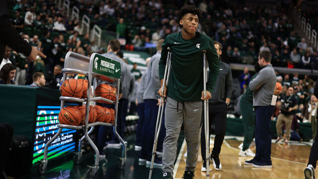 EAST LANSING, MICHIGAN - JANUARY 4: Jeremy Fears Jr. of the Michigan State Spartans looks on from the sideline before a game against the Penn State Nittany Lions at Breslin Center on January 4, 2024 in East Lansing, Michigan.