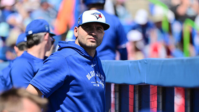 DUNEDIN, FLORIDA - MARCH 19: Joey Votto #37 of the Toronto Blue Jays looks on from the dugout during a 2024 Grapefruit League Spring Training game against the Baltimore Orioles at TD Ballpark on March 19, 2024 in Dunedin, Florida.