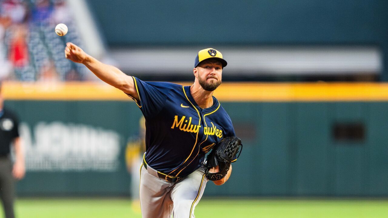ATLANTA, GA - AUGUST 6: Colin Rea #48 oof the Milwaukee Brewers pitches in the fourth inning against the Atlanta Braves at Truist Park on August 6, 2024 in Atlanta, Georgia.