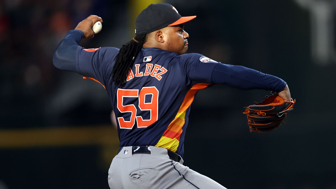 ARLINGTON, TEXAS - AUGUST 06: Framber Valdez #59 of the Houston Astros throws a pitch against the Texas Rangers in the first inning at Globe Life Field on August 06, 2024 in Arlington, Texas.