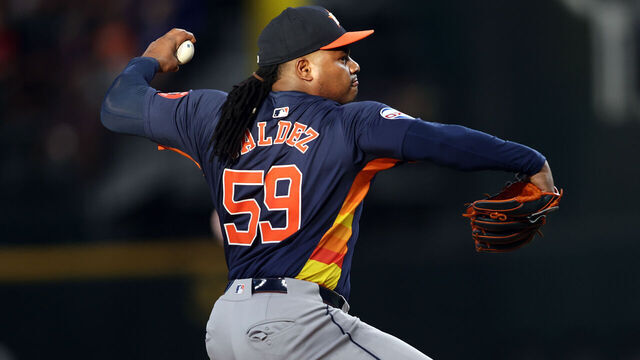 ARLINGTON, TEXAS - AUGUST 06: Framber Valdez #59 of the Houston Astros throws a pitch against the Texas Rangers in the first inning at Globe Life Field on August 06, 2024 in Arlington, Texas.