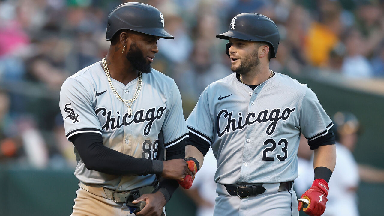 OAKLAND, CALIFORNIA - AUGUST 06: Andrew Vaughn #25 of the Chicago White Sox celebrates his two-run home run with Luis Robert Jr. #88 in the top of the fourth inning against the Oakland Athletics at Oakland Coliseum on August 06, 2024 in Oakland, California.