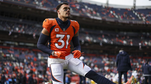 DENVER, CO - DECEMBER 31: Justin Simmons #31 of the Denver Broncos warms up prior to an NFL football game against the Los Angeles Chargers at Empower Field at Mile High on December 31, 2023 in Denver, Colorado.