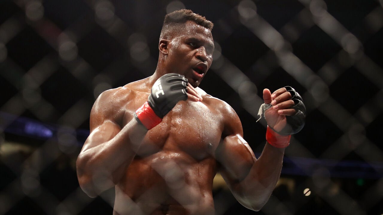 ANAHEIM, CALIFORNIA - JANUARY 22: Francis Ngannou of Cameroon looks on against Ciryl Gane of France in their heavyweight title fight during the UFC 270 event at Honda Center on January 22, 2022 in Anaheim, California.