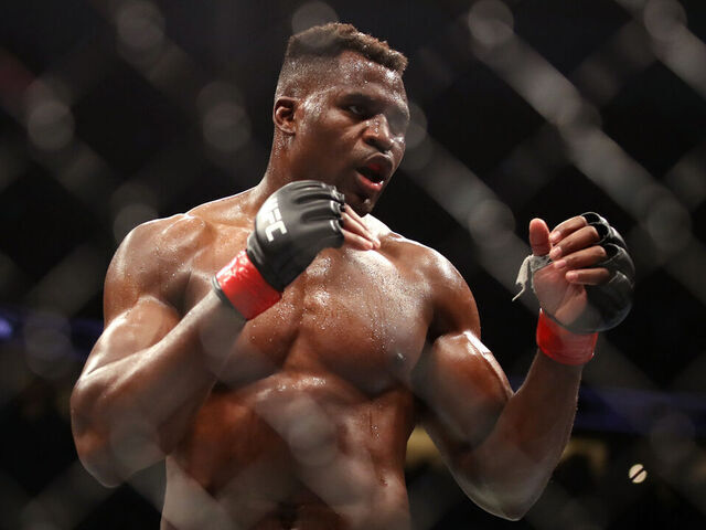 ANAHEIM, CALIFORNIA - JANUARY 22: Francis Ngannou of Cameroon looks on against Ciryl Gane of France in their heavyweight title fight during the UFC 270 event at Honda Center on January 22, 2022 in Anaheim, California.