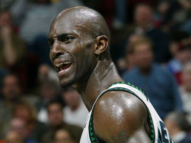 3/14/03 - Minnesota Timberwolves vs. LA Lakers at the Target Center -- Minnesota forward Kevin Garnett is frustrated with officials during the first quarter when he thought one of the Los Angeles Lakers should be penalized or goaltending and the official didn't make the call.