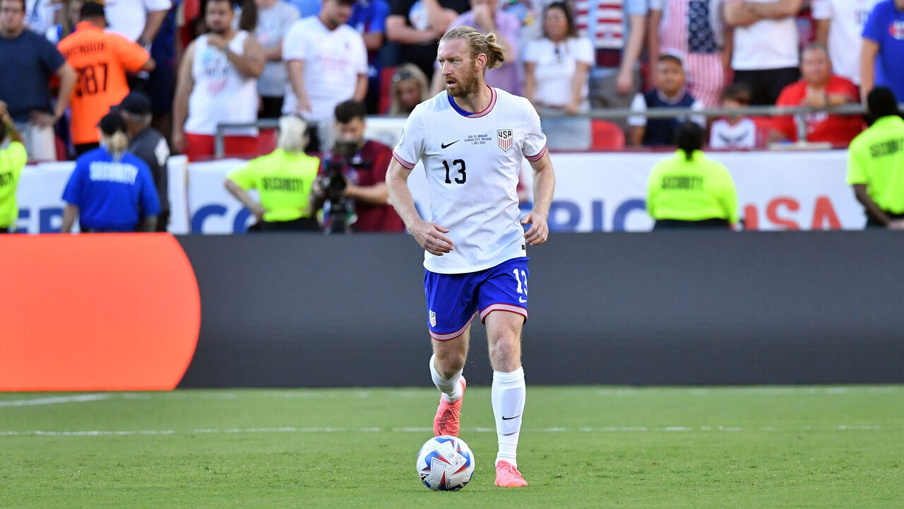 KANSAS CITY, MISSOURI - JULY 1: Tim Ream #13 of United States with the ball during the CONMEBOL Copa America group C match between the United States and Uruguay at GEHA Field at Arrowhead Stadium on July 1, 2024 in Kansas City, Missouri.