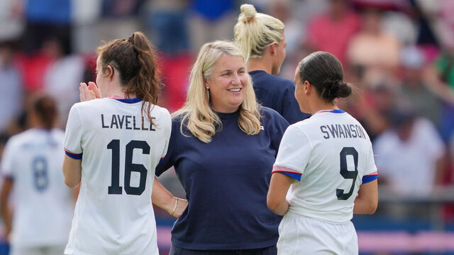PARIS, FRANCE - AUGUST 03: United States head coach Emma Hayes celebrates with Mallory Swanson #9 and Rose Lavelle #16 after playing Japan during the Women's Quarterfinal match during the Olympic Games Paris 2024 at Parc des Princes on August 03, 2024 in Paris, France.