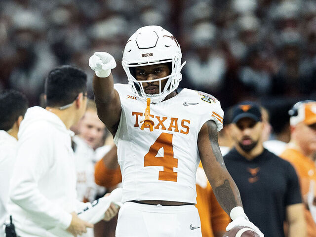 NEW ORLEANS, LA - JANUARY 01: Texas Longhorns running back CJ Baxter (4) catches a pass during the CFP Semifinal Allstate Sugar Bowl game between the Texas Longhorns and the Washington Huskies on January 01, 2024, at the Caesars Superdome in New Orleans, Louisiana.