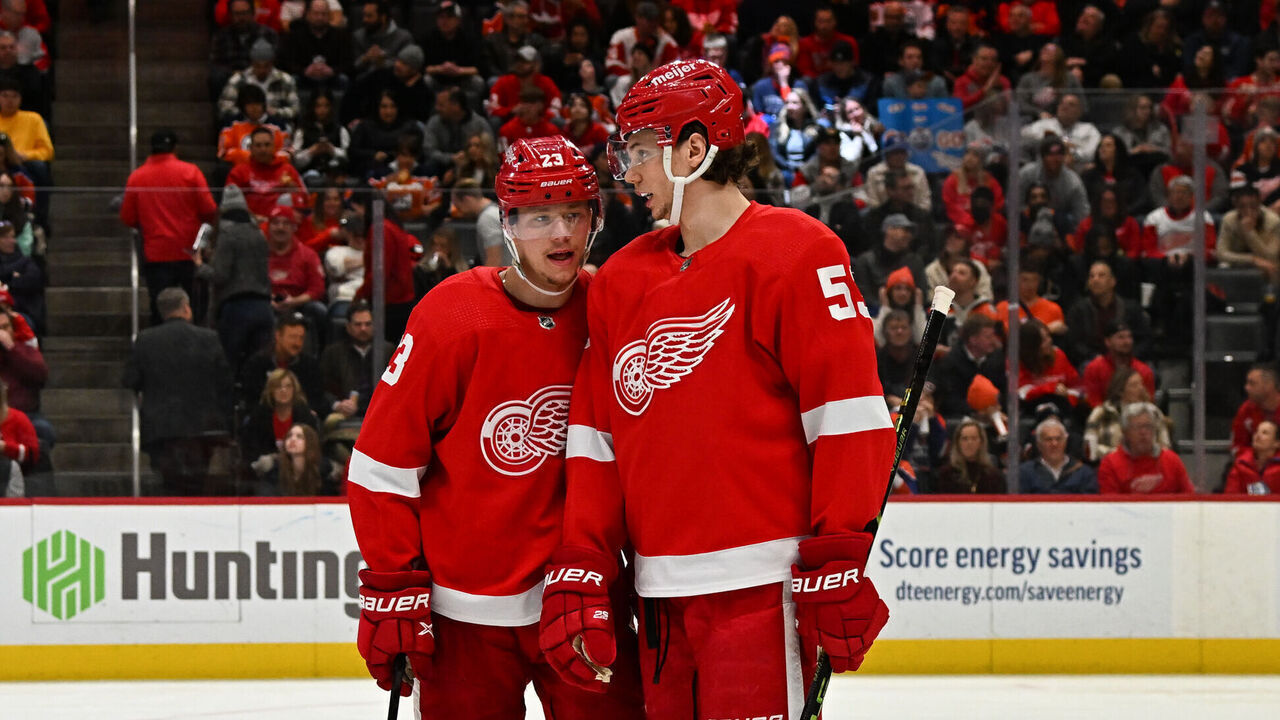 DETROIT, MI - FEBRUARY 07: Detroit Red Wings left wing Lucas Raymond (23) and Detroit Red Wings defenseman Moritz Seider (53) talk prior to a faceoff during the game between the Detroit Red Wings and the Edmonton Oilers on Tuesday Febuary 7, 2023 at Little Caesars Arena in Detroit, MI.