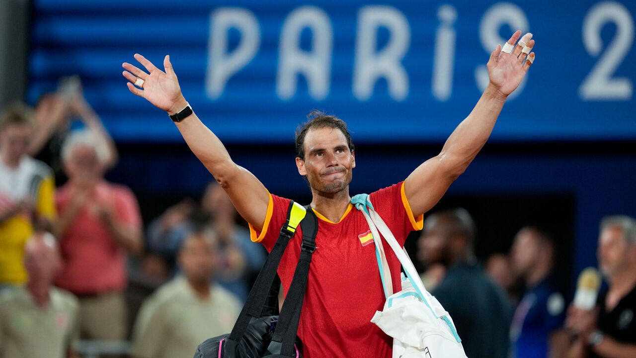 PARIS, FRANCE - JULY 31: Rafael Nadal of Spain waves to the crowd after losing in the Men's Double Quarterfinal on day five of the Olympic Games Paris 2024 at Roland Garros on July 31, 2024 in Paris, France.