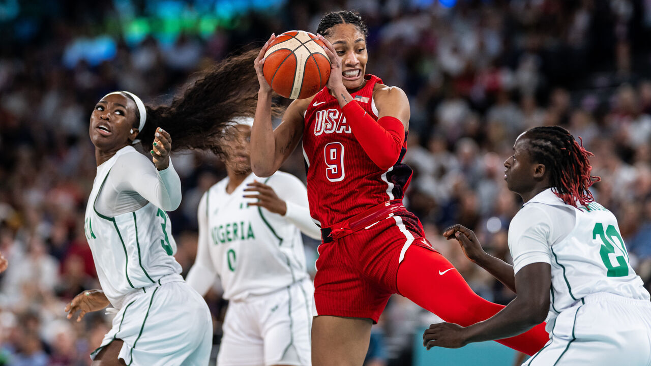 PARIS, FRANCE - AUGUST 07: A'ja Wilson of USA catches the ball close to Murjanatu Musa nn (R) while women´s quarterfinal match between Nigeria and USA on day twelve of the Olympic Games Paris 2024 at Bercy Arena on August 07, 2024 in Paris, France.