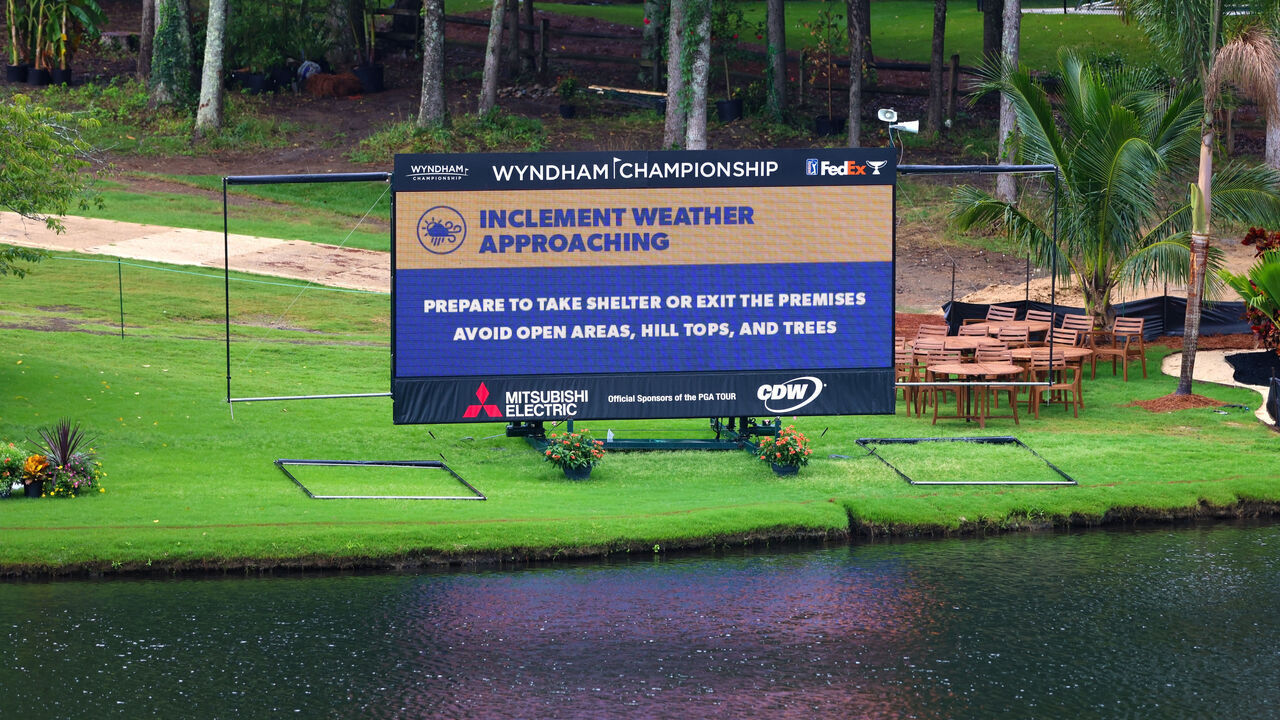 GREENSBORO, NORTH CAROLINA - AUGUST 07: The leaderboard announces inclement weather during practice before the Wyndham Championship at Sedgefield Country Club on August 07, 2024 in Greensboro, North Carolina.