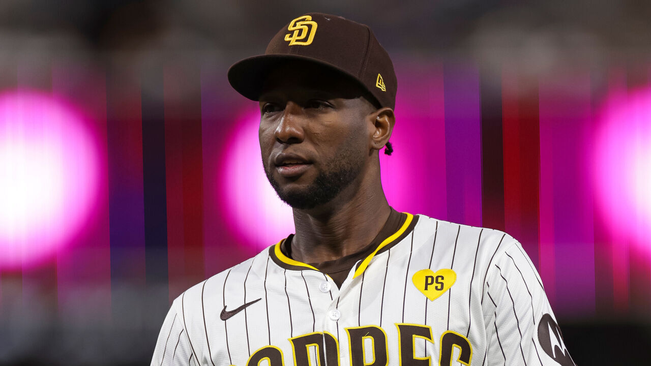 SAN DIEGO, CALIFORNIA - JULY 31: Jurickson Profar #10 of the San Diego Padres walks towards the dugout in the eighth inning during a game against the Los Angeles Dodgers at Petco Park on July 31, 2024 in San Diego, California.