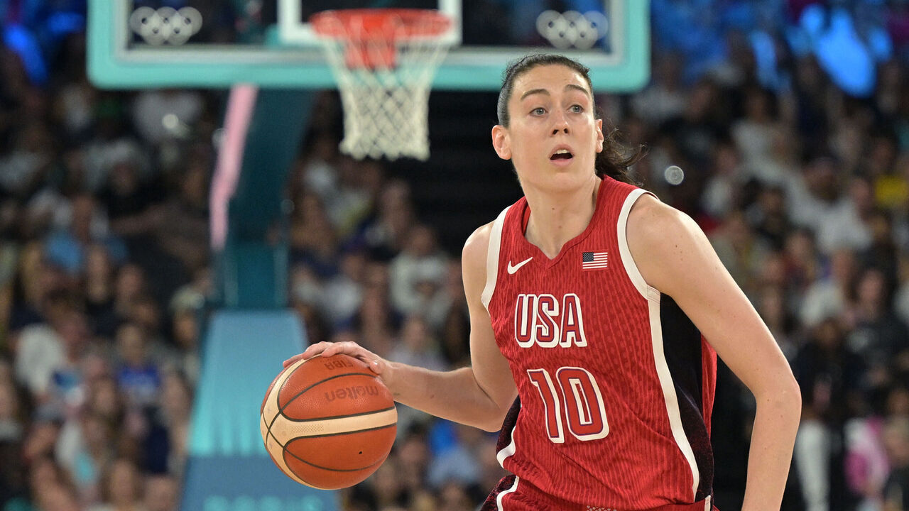 USA's #10 Breanna Stewart runs with the ball in the women's quarterfinal basketball match between Nigeria and USA during the Paris 2024 Olympic Games at the Bercy Arena in Paris on August 7, 2024.