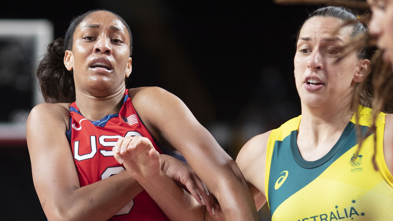 TOKYO, JAPAN August 4: Marianna Tolo #14 of Team Australia defended by A'Ja Wilson #9 of Team United States during the USA V Australia quarter final match in the basketball competition for women at the Saitama Super Arena during the Tokyo 2020 Summer Olympic Games on August 4, 2021 in Tokyo, Japan.