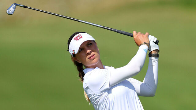 PARIS, FRANCE - AUGUST 08: Morgane Metraux of Team Switzerland plays her second shot on the 10th hole during Day Two of the Women's Individual Stroke Play on day thirteen of the Olympic Games Paris 2024 at Le Golf National on August 08, 2024 in Paris, France.