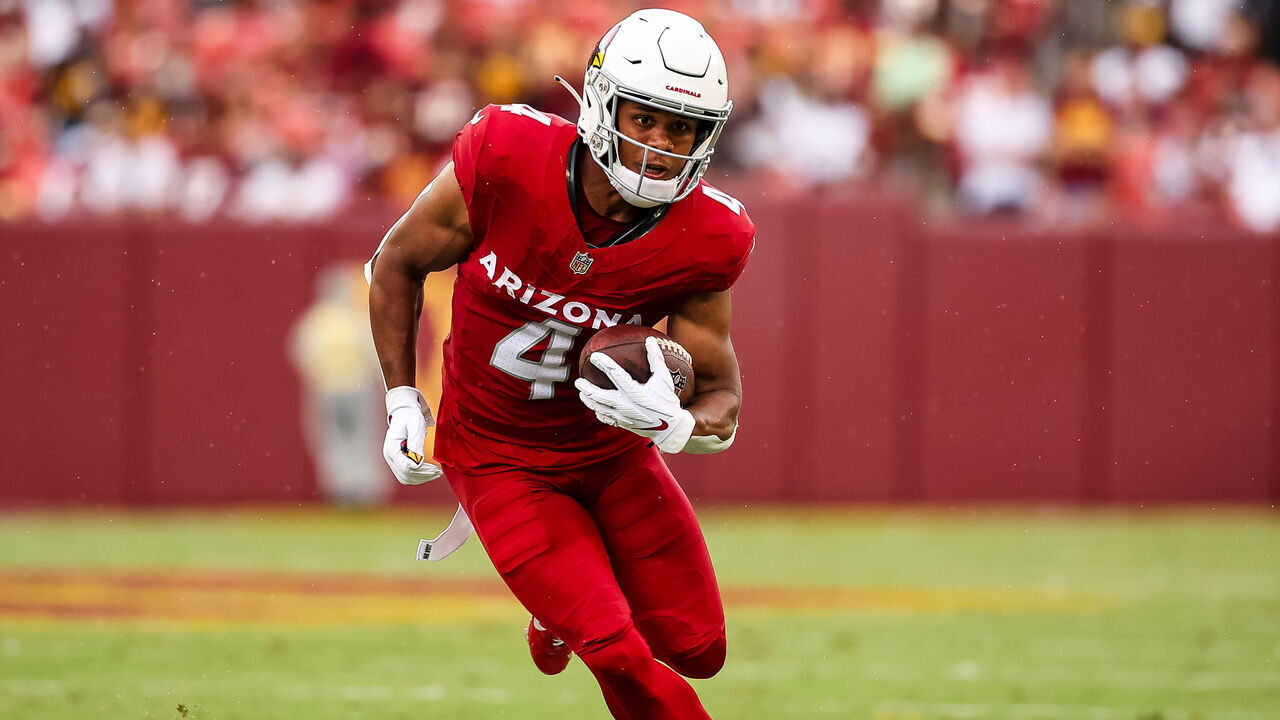 LANDOVER, MD - SEPTEMBER 10: Rondale Moore #4 of the Arizona Cardinals carries the ball against the Washington Commanders during the second half of the game at FedExField on September 10, 2023 in Landover, Maryland.
