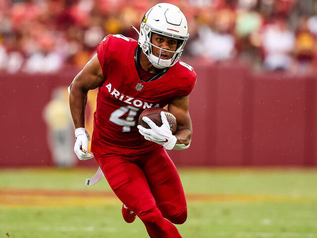 LANDOVER, MD - SEPTEMBER 10: Rondale Moore #4 of the Arizona Cardinals carries the ball against the Washington Commanders during the second half of the game at FedExField on September 10, 2023 in Landover, Maryland.