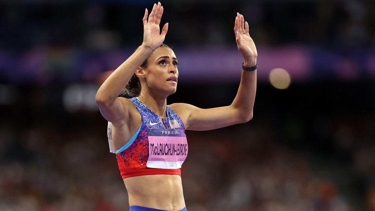 PARIS, FRANCE - AUGUST 08: Sydney McLaughlin-Levrone of Team United States celebrates winning the gold medal with the new World Record after competing in the Women's 400m Hurdles Final on day thirteen of the Olympic Games Paris 2024 at Stade de France on August 08, 2024 in Paris, France.