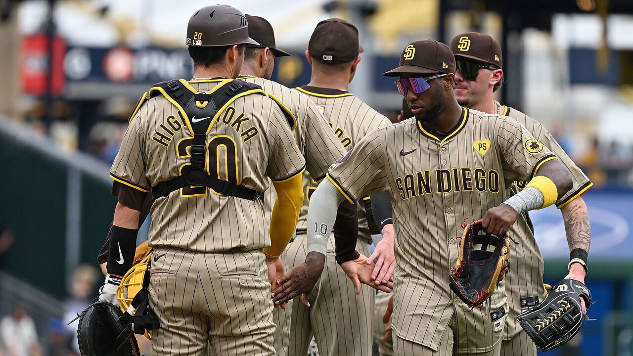 PITTSBURGH, PENNSYLVANIA - AUGUST 8: Members of the San Diego Padres celebrate after the final out in a 7-6 win over the Pittsburgh Pirates during the game at PNC Park on August 8, 2024 in Pittsburgh, Pennsylvania.