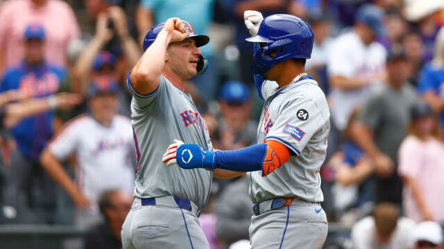 DENVER, CO - AUGUST 8: Mark Vientos #27 of the New York Mets (R) is congratulated by Pete Alonso #20 after hitting a two run home run during the fifth inning against the Colorado Rockies at Coors Field on August 8, 2024 in Denver, Colorado.