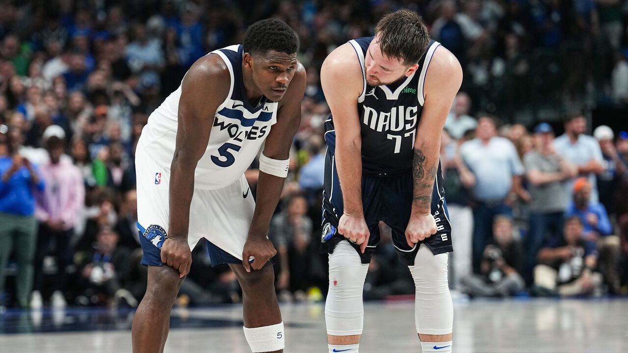 DALLAS, TX - MAY 26: Anthony Edwards #5 of the Minnesota Timberwolves and Luka Doncic #77 of the Dallas Mavericks looks on during the game during Game 3 of the Western Conference Finals of the 2024 NBA Playoffs on May 26, 2024 at the American Airlines Center in Dallas, Texas. Mandatory Copyright Notice: Copyright 2024 NBAE