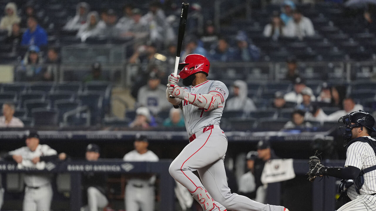 BRONX, NY - AUGUST 08: Los Angeles Angels Right Fielder Jo Adell (7) hits a single during the fourth inning of the Major League Baseball game between the Los Angeles Angels and the New York Yankees on August 8, 2024, at Yankee Stadium in the Bronx, NY.