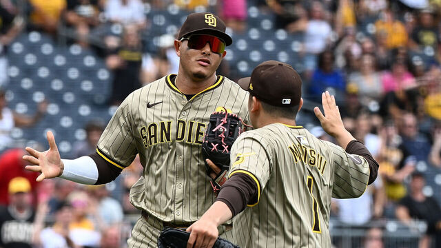 PITTSBURGH, PENNSYLVANIA - AUGUST 8: Yuki Matsui #1 of the San Diego Padres celebrates with Manny Machado #13 after the final out of the sixth inning during the game against the Pittsburgh Pirates at PNC Park on August 8, 2024 in Pittsburgh, Pennsylvania.
